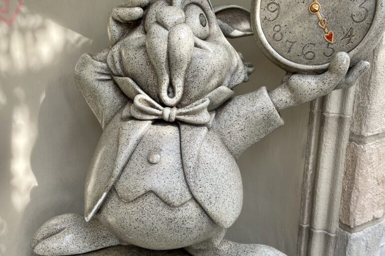Alice in Wonderland Ride Review 67 White Rabbit holding pocket watch