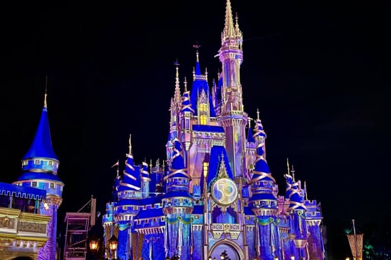Ultimate Guide to the Bibbidi Bobbidi Boutique at Walt Disney World 13 Castle Lit-up at night