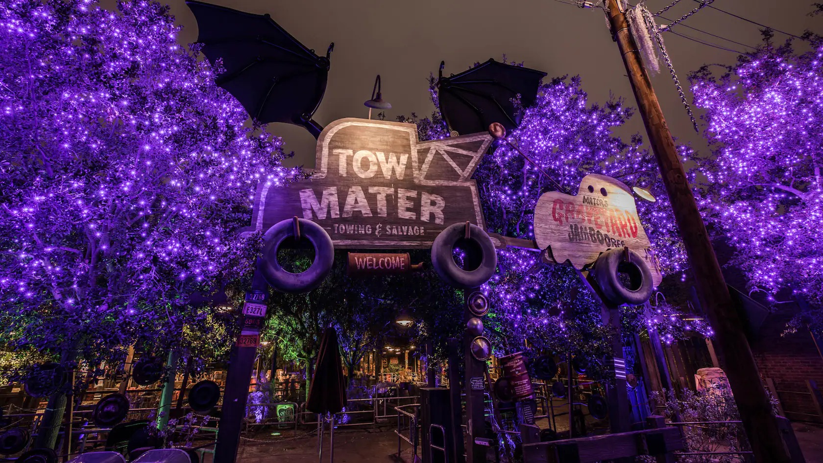 Attraction signage at night with lights