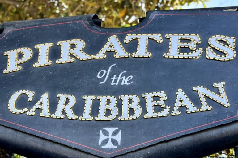 Disney Park Attractions So Good They Became Films 34 Sign for Pirates attraction