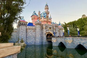 Everything You Need To Know About The Disneyland Holidays 1 Castle with snow on top