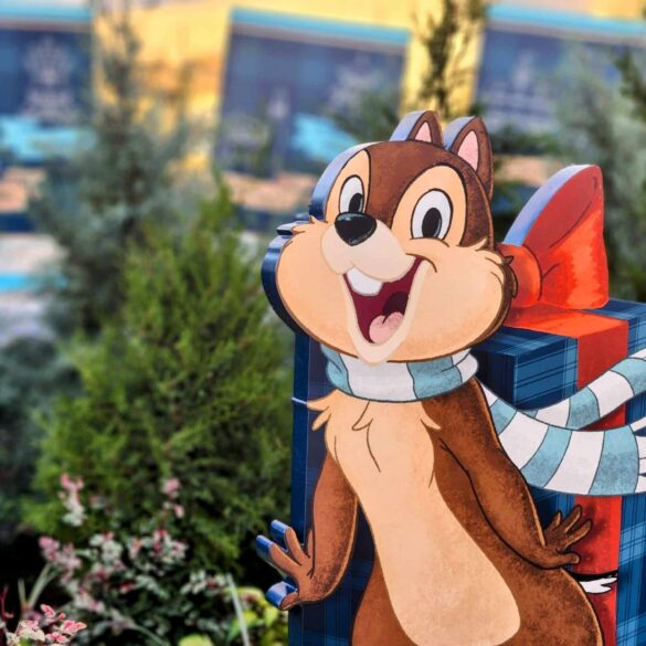 Epcot 2023 Festival of the Holidays Guide 1 Chip the Chipmunk with a scarf at the Epcot International Festival of the Holidays